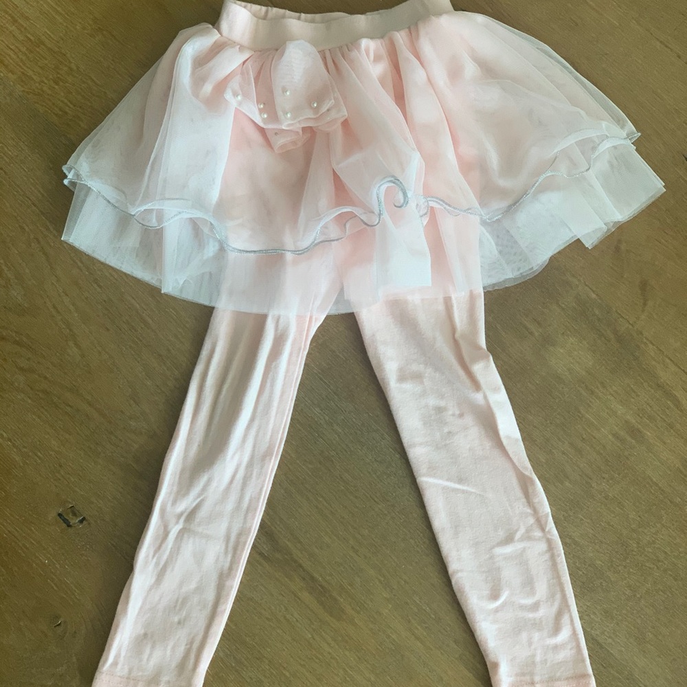 Adorable leggings with tutu skirt.